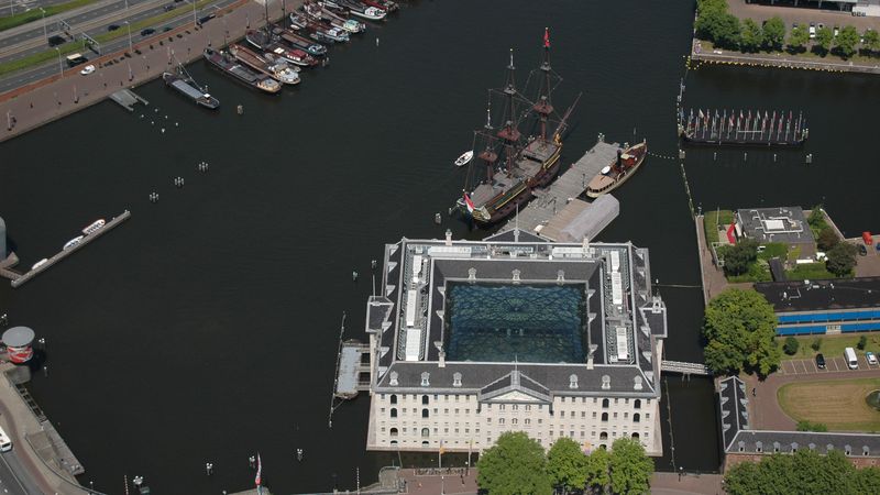 Aerial photo of  the ship and building of the Dutch Maritime Museum in Amsterdam