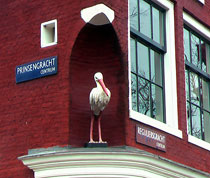 Stork statue Amsterdam midwife