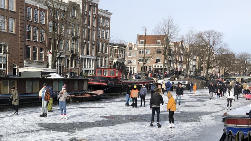 Winter in Amsterdam people skating