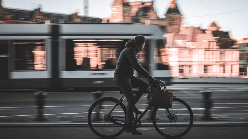 Transport in amsterdam with bicycle or tram